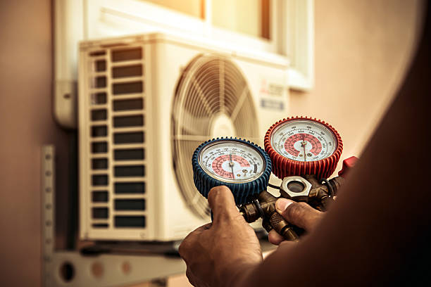 Professional Hvac technician working in Spring Glen, PA
